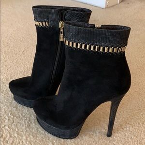 Never Used. Bebe boots. Faux black suede.